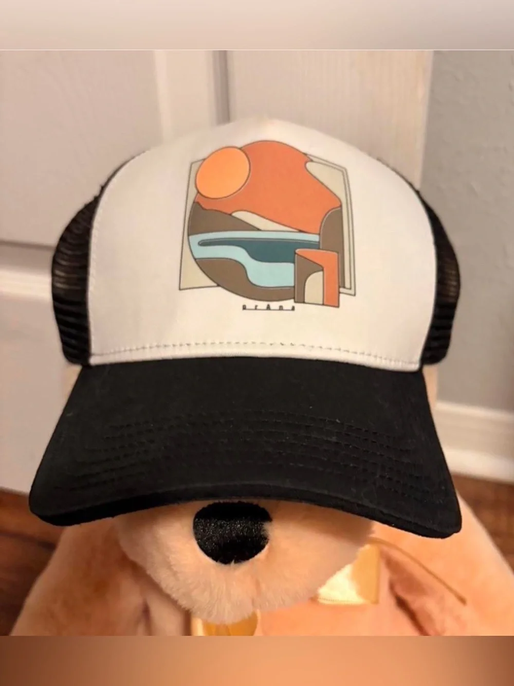 Source Unknown Black and White Trucker Hat with Orange Graphic